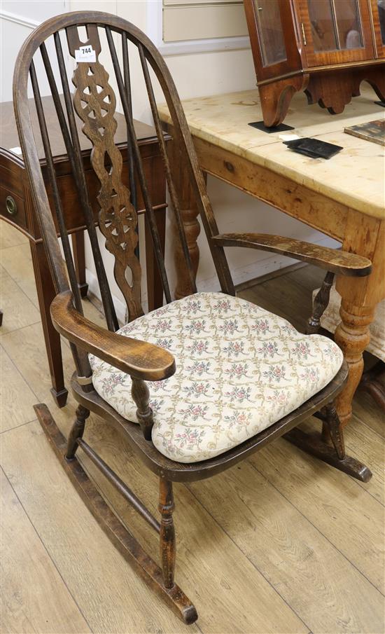 An oak and beech Windsor style rocking chair